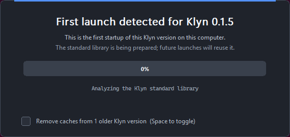 Klyn first-launch standard-library preparation window with progress and optional old-cache cleanup